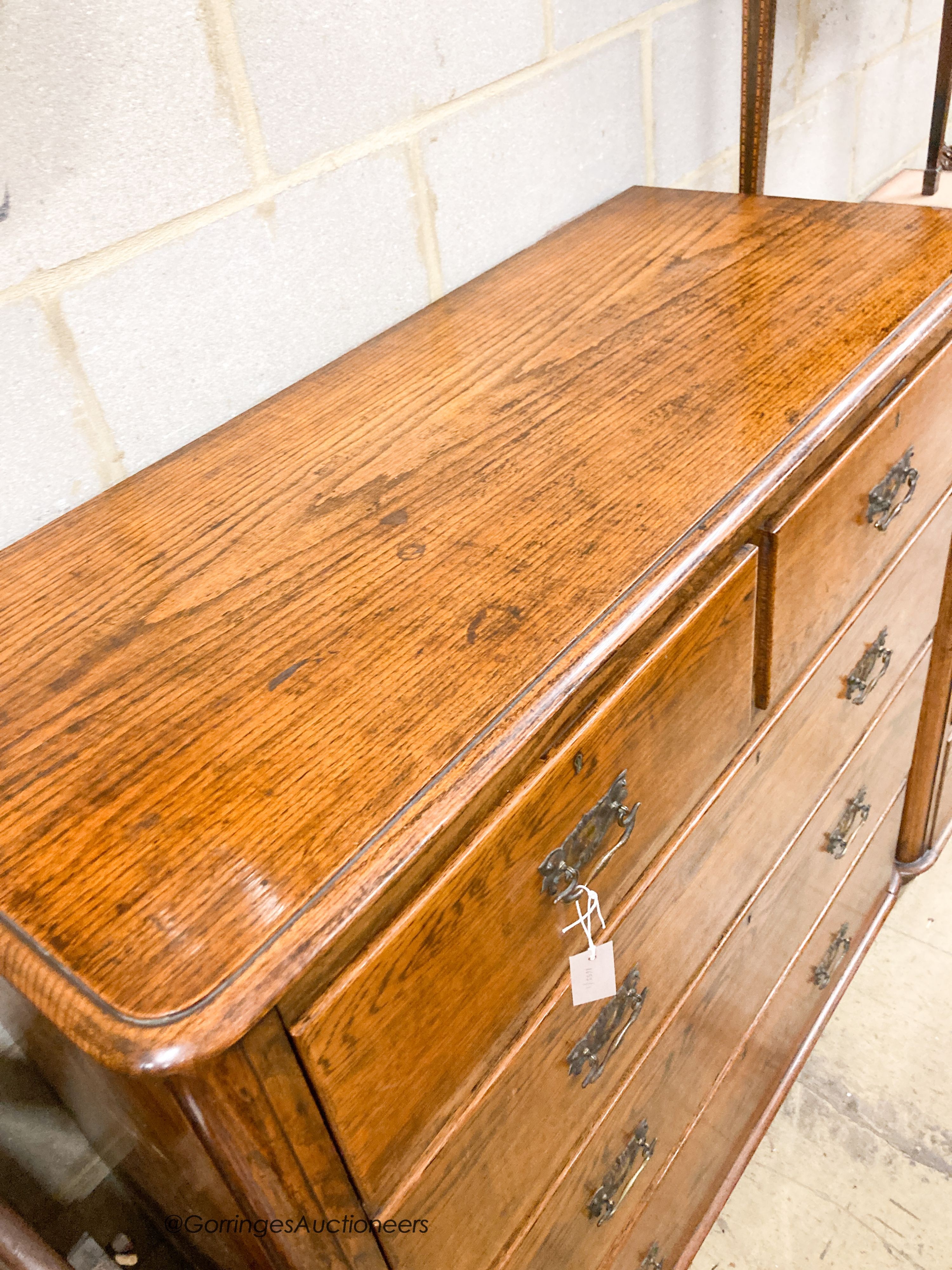 A late Victorian oak chest of drawers, width 120cm, depth 50cm, height 160cm